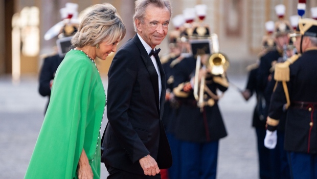 Bernard Arnault and his wife Helene arriving to meet with Pope